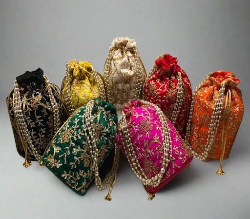 colorful embroidered potli bags Indian wedding favor