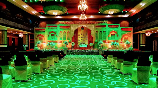 Kasturi Bagh Jaipur banquet hall interior with decorated stage and seating arrangement for Indian wedding